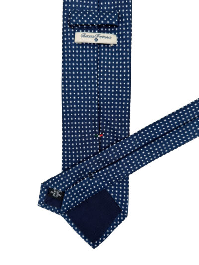 Corbata twill fondo azul marino estampada con mini cuadros y mini círculos blancos