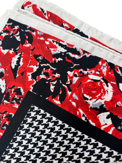 Pochette pata de gallo y flores en negros y rojos